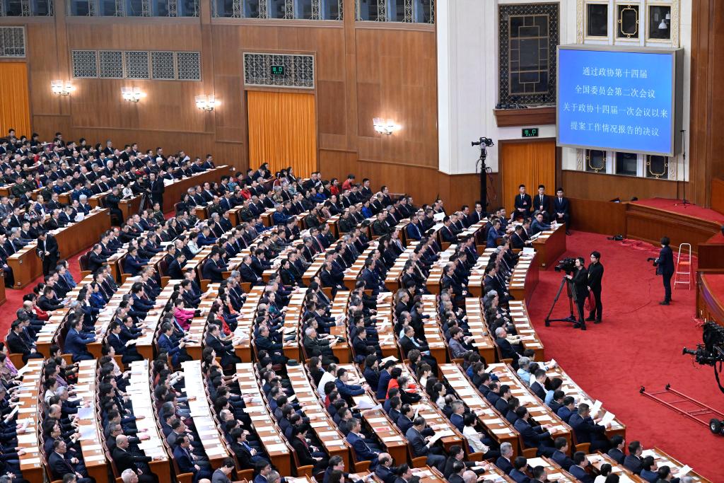 3月10日，中國人民政治協商會議第十四屆全國委員會第二次會議在北京人民大會堂舉行閉幕會。新華社記者 申宏 攝